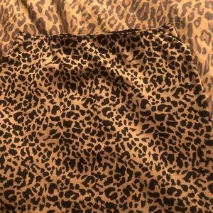 Sans Souci  size small black & brown leopard print stretch mini skirt